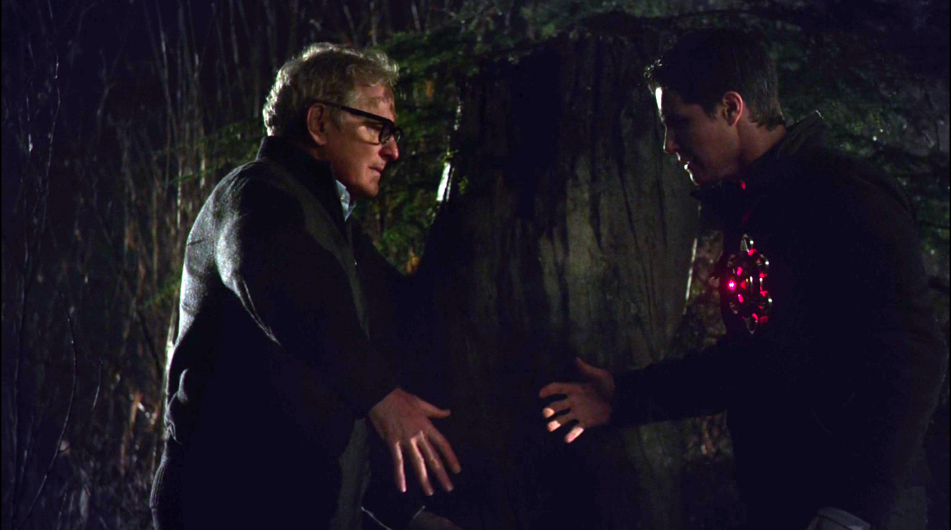 Victor Garber as Professor Martin Stein and Robbie Amell as Ronnie Raymond fusing to form Firestorm on The Flash